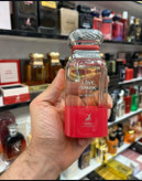 ادکلن زنانه شرکت الحمبرا مدل لاو اسپارک رایحه تام فورد چری الکتریک حجم 80 میل