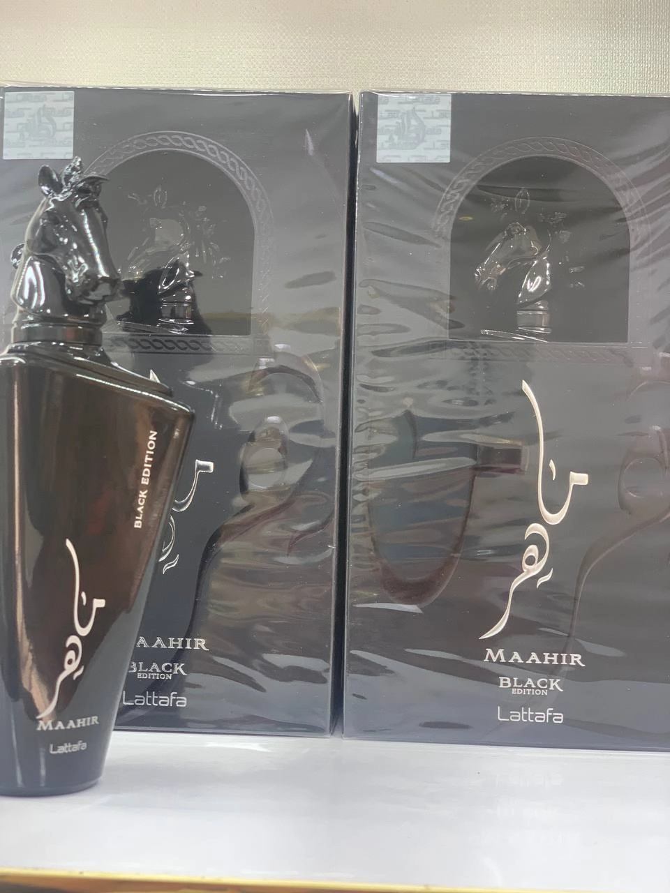 ادکلن مردانه شرکت لطافه مدل ماهر مشکی حجم 100 میل