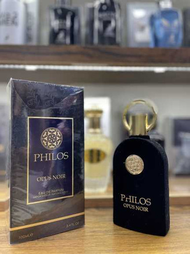 ادکلن مردانه زنانه شرکت الحمبرا مدل فیلوس اوپوس نویر رایحه سوسپیرو اوپرا حجم 100 میل